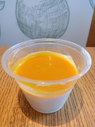 Panacotta au lait de coco et coulis de mangue - Photo 1